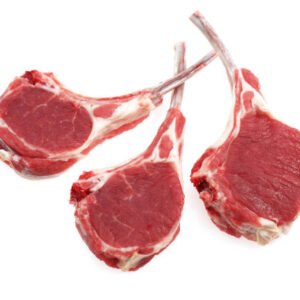 fresh lamb chops against white background