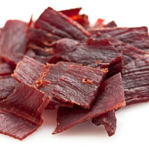 pile of beef jerky on white background