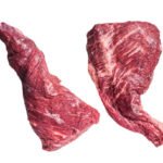 raw tri tip beef steak on kitchen table. isolated on white background.